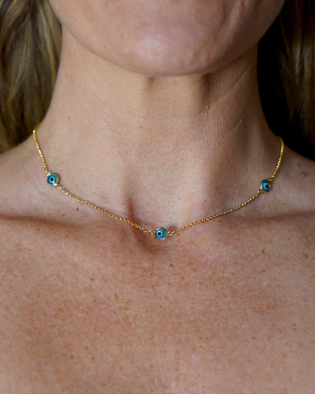 Gold protective eye necklace