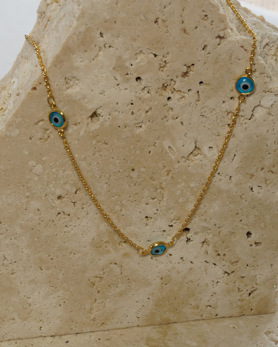 Gold protective eye necklace